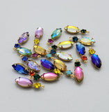 vitrail-navette-shaped-stone-and-round-rhinestone-brass-prong-settings